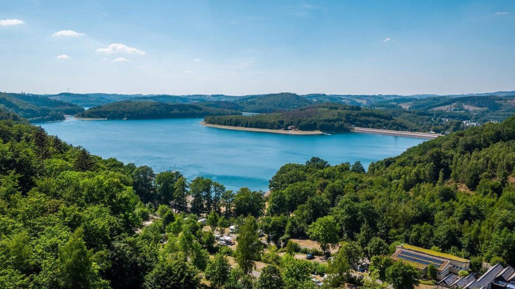 lakeside holiday park at Biggesee in Germany with modern cabins and scenic water views