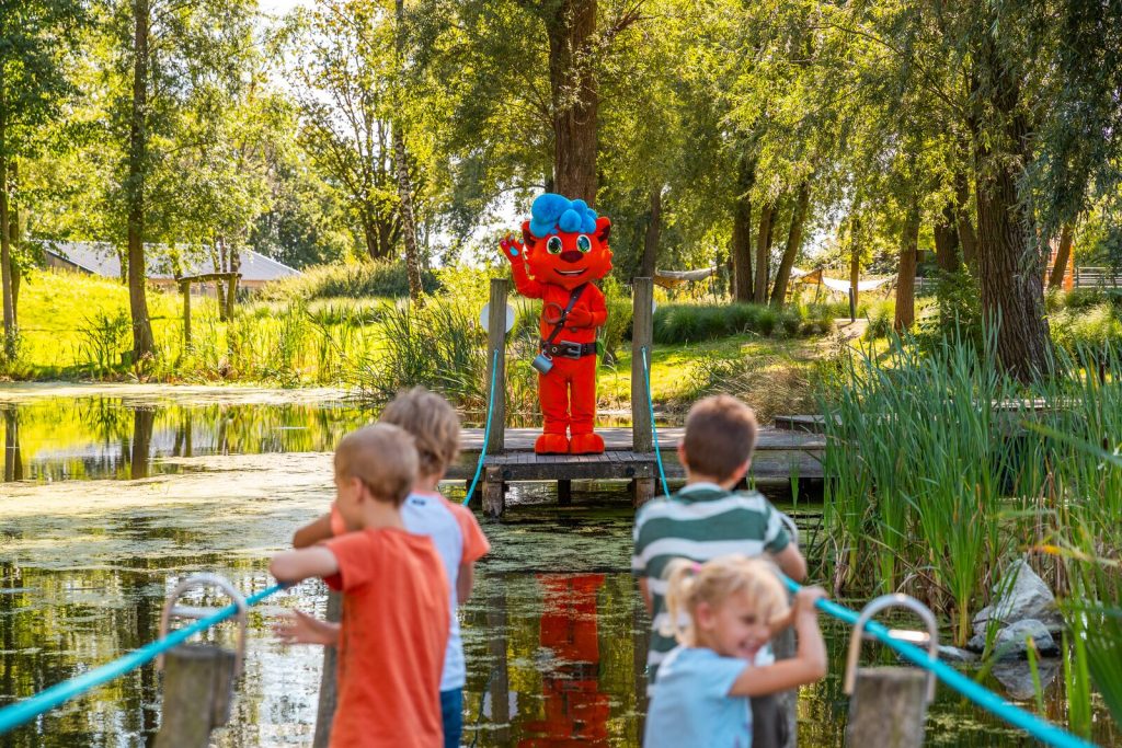 Bright family holiday park in Germany with forest cabins and outdoor activities for kids