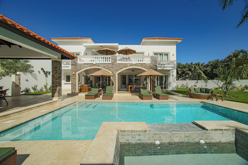 Family holiday park in Germany with colorful water slides and kids playing in pool