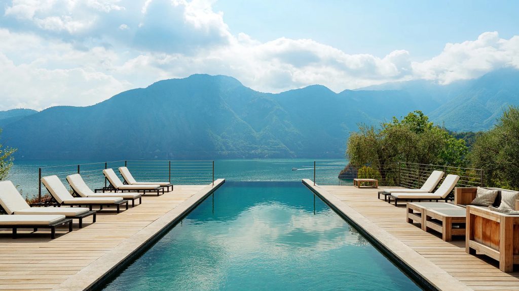 luxury holiday park in Germany with infinity pool, lakeside villas, and mountain views